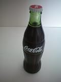 41fB6hJ8yXL. SL160  Coca Cola Bottle with Revolving Bear Behind Closing Door 5.75    as shown