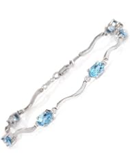 14k Gold Tennis Bracelet with Genuine Round Diamonds & Oval Blue Topazes