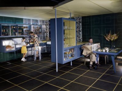 American Family Gathers in an Innovative Glass Kitchen Photographic Poster Print by Willard Culver, 18x24