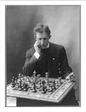 IMAGE OF Historic Print (M): [Frank James Marshall, 1877-1944, half, seated at chess board, facing front]