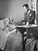 Hospital Chaplain Russell L. Dicks Reading Prayers to an Ill Patient Photographic Pos...