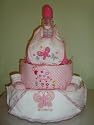 Garden Themed Large 4 Layer Baby Girl Diaper Cake (Decorated All Around) - Comes Decoratively Wrapped Making it a Great Gift or Shower Centerpiece - Other Gift Options Also Available