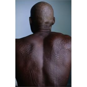 photographie Crocodile skin cutting, a ceremony still performed on the Sepik River. est disperibl...