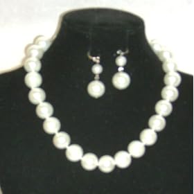 Click here to buy One Strand Large Simulated White Pearls Short Chain Necklace and Earrings for Women and Teens by Gita.