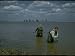 Fisherman and Kazakh Woman Sweep Net Fishing for Osetr Sturgeon at Tanya Molodeznaya ...