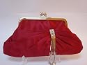 Red satin clutch handbag with diamante decoration