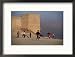 Children Playing Soccer Near Disused Fort, Kabul, Afghanistan Framed Photographic Poster Print by Stephane Victor, 21x17