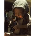 Malnourished Vietnamese Child Eating Can of American C Rations at Refugee Camp Photographic Poster Print by Paul Schutzer, 30x40