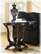 Alexus Round End Table By Ashley Furniture