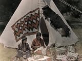 Two American Indians Mend Clothing Outside their Tipi Photographic Poster Print by Edwin L. Wisherd, 24x18