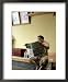Sumo Wrestler Reading Newspaper, Tokyo City, Honshu Island, Japan Framed Art Poster Print by Christian Kober, 18x22