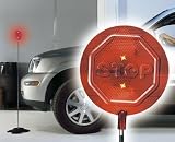 Motion-sensing flashing garage parking signal