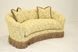 Beautiful Curved Love Seat in gold fabric with fringe base:
Carolina Sofa 