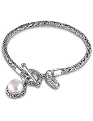Sterling Silver This beautiful sterling silver and white mother of pearl bracelet by Sara Blaine is the perfect compliment to any ensemble.
