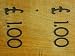 Close-up of a Wooden Board with Engraved Numbers and Currency Symbols Photographic Poster Print, 16x12