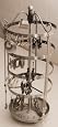 Earring Tree, Holder, Organizer, Antique Pewter (muted silver) Metal, Circular, Round, Turns Manually, Rotates, Holds 75 Pair of Earrings Plus More! Earring-Go-Round, Patent Protected, Est. 2009