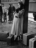 Girl Arriving at Train Station to Attend the Dartmouth College Winter Carnival Photographic Poster Print by Peter Stackpole, 12x16