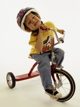4 Year Old Boy Posing on His Tricycle, New York, New York, USA Photographic Poster Print by Paul Sutton, 18x24