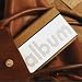 from ALBUMteam ALBUM 7 inch High-Resolution Digital Photo Viewer - Tan Leather Case and Silver Metal Case Model ALBUMTAN