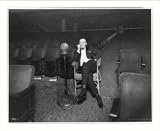 Historic Print (L): [Samuel L. Rothafel, full-length portrait, seated, in Capitol Theater, NYC, using Wester