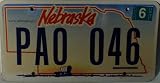 Nebraska Non-Embossed License Plate with Blue Wagon