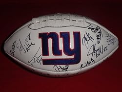 Super Bowl XLVI Champions New York Giants Team Autographed Logo Football with 27 Signatures Total! Proof Photos of the Giants Signing for Us.