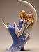 Beautifull Lady Sitting on Half Moon Figurine