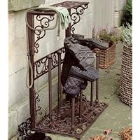 metal (wrought iron) wellington boot stand showing pair of wellington boots