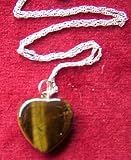 Review   / Tigers Eye Heart Pendant;2cms across; on silver chain approx 40cms long - from Spiritual Gifts. Usually dispatched within 2 working days.