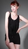 DEBUE Sleeveless Zipper Front Ruffle Romper Black