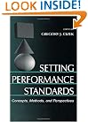 Setting Performance Standards: Theory and Applications
