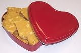 Scott's Cakes Macadamia Nut Brittle in a Heart Shape Tin