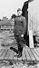 1918? photo Merritt Austin Edson, full-length portrait, standing in front of barracks?, in uniform,