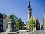 IMAGE OF Poorters Loge and Jean Van Eyck Statue, Bruges, Belgium Photographic Poster Print by Nigel Francis, 18x24