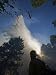 A helicopter makes water drops on a wildfire in Boise National Forest Photographic Po...