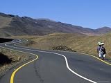 Women Carry Bundles Along a New Road in Lesotho, Africa Photographic Poster Print, 18x24