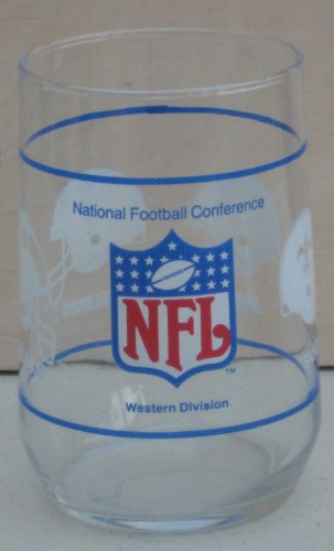 Collectible Clear Drinking Glass with letters NFL and emblem in red, white and blue etching / National Football Conference Western Division etched in blue / 4 helmets etched in white with SAINTS, 49ers. FALCONS, RAMS, etched in white under each helmet - 16 oz - 4 1/2 inches tall x 2 3/4 inches in diameter