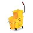 Rubbermaid Commercial Products - Rubbermaid Commercial - Wavebrake 26-Quart Side Press Mop Bucket & Wringer Combo, Yellow - Sold As 1 Each - Dirty Water Separation feature produces cleaner, less slippery floors. - 18% less effort to wring mop. - Space-saving nesting feature. - Nonmarking 3" casters. -