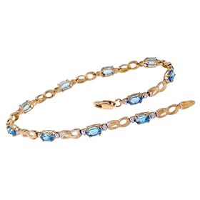 10K Yellow Gold Blue Topaz and Diamond Bracelet by The Jewelers Collection