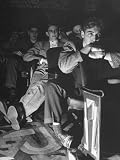 The Local Movie Theater, Boys Have a Very Difficult Time Finding a Place to Put Their Long Legs Photographic Poster Print by Nina Leen, 18x24
