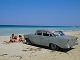 1950s American Car on the Beach, Goanabo, Cuba, Caribbean Sea, Central America Art Photographic Poster Print by Bruno Morandi, 16x12