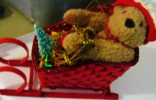 Teddy Bear Santa in A Red Sleigh Full of Presents