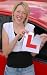 Woman Holding Ripped L Plate after Passing Driving Test - 24H x 15W - Peel and Stick Wall Decal by Wallmonkeys