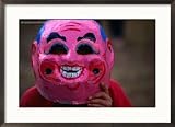 Boy Wearing Colourful Mask at Tet Nguyen Dan Celebrating Lunar New Year Holiday, Da Lat, Vietnam Garbage Can Framed Photographic Poster Print by Anders Blomqvist, 29x21