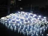 Cool White (646) 12volt SMC LED Flexible Strip Lighting, 5 Metre Long / 300 LED's With 3M Adhesive Tape Backing for Easy Surface Mount Installation. These LED Ribbon Strips are Ideal For Decorative Lighting, Mood Lighting, Under Kitchen Cabinet Lighting, Indirect Lighting and so on and are Supplied on a Roll. This Listing is for the LED Strip WITHOUT the 12 Volt 3 Pin Power Supply Adapter.