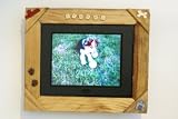 Voclan Digital Photo Frame 8LCD by SHARP.Includes rustic wood frame with pets name in whimsical scrabble like letters and doggy accents.The ONLY ONE that fits most 8x10 picture frames for future decor changes.Play MP3 & Video in stereo