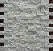 4x4 sample of Split Face 1x2 Classic Beige Travertine