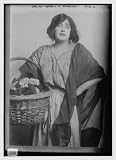 Photo (L): Mrs. Pat Campbell in 