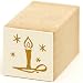 beautiful small candle with star wooden Christmas stamp