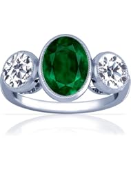 Platinum Oval Cut Emerald Three Stone Ring
